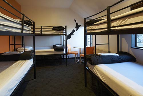 Dorm with 6 Bunk beds and black pillow