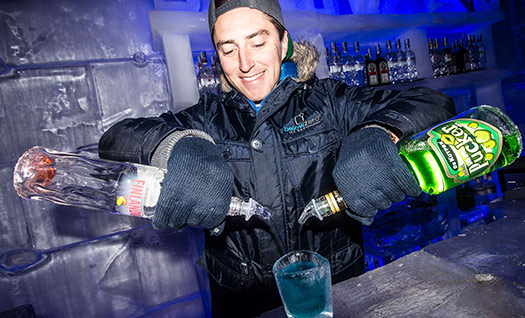 Bartender serving drinks at the Below Zero Ice Bar in Queenstown