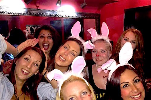 Girls with their Easter bunny ears on during the Big Night Out pub crawl in Queenstown for the big Easter weekend party