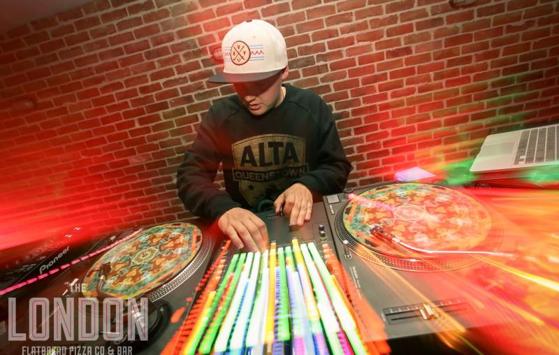 DJ spinnning Pizzas on record turntable
