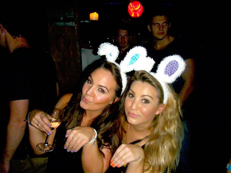 Two attractive women in Queenstown with bunny ears on their heads