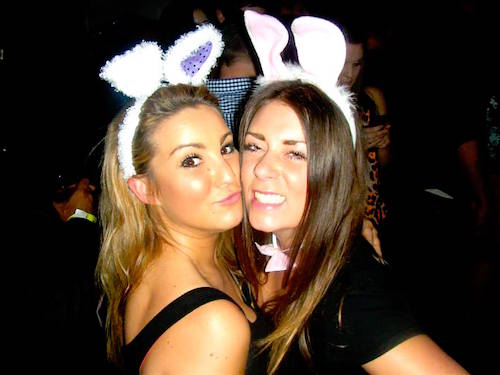 Girls partying on the big night out pub crawl in Queenstown for the Easter Weekend celebrations with bunny ears