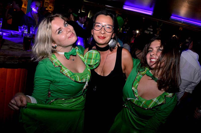 Stunning Big Night Out Party crew dressed in their Irish finery on St Patrick's Day in Queenstown. The DJ in the middle is in her best DJ black