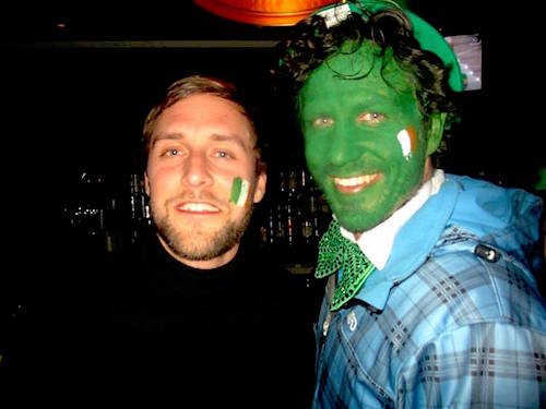 Guys on the big night out pub crawl in Queenstown club for St Paddy’s day party with face paint & St Patrick’s day outfit