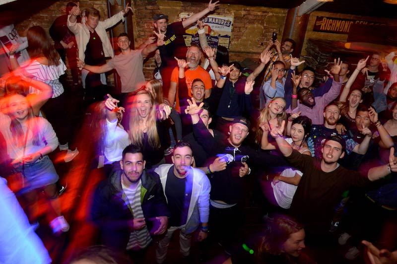 Partygoers in Queenstown Pub