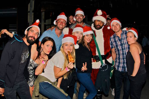 Santa pub crawl in Queenstown clubs with the crew from big night out Santa hats and free pizza
