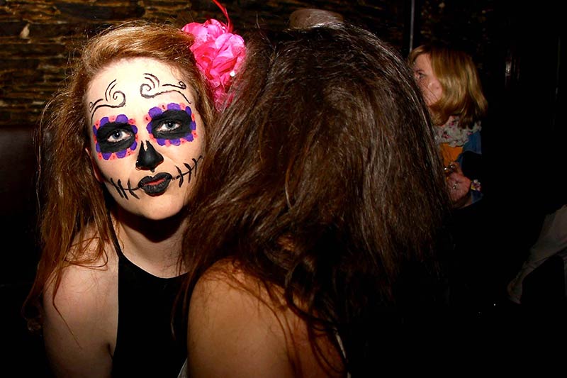 Girls at Queenstown club skull face paint day of the dead