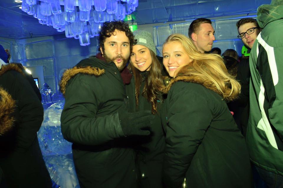 two girls and a guy at the below zero ice bar in Queenstown with the big night out pub crawl