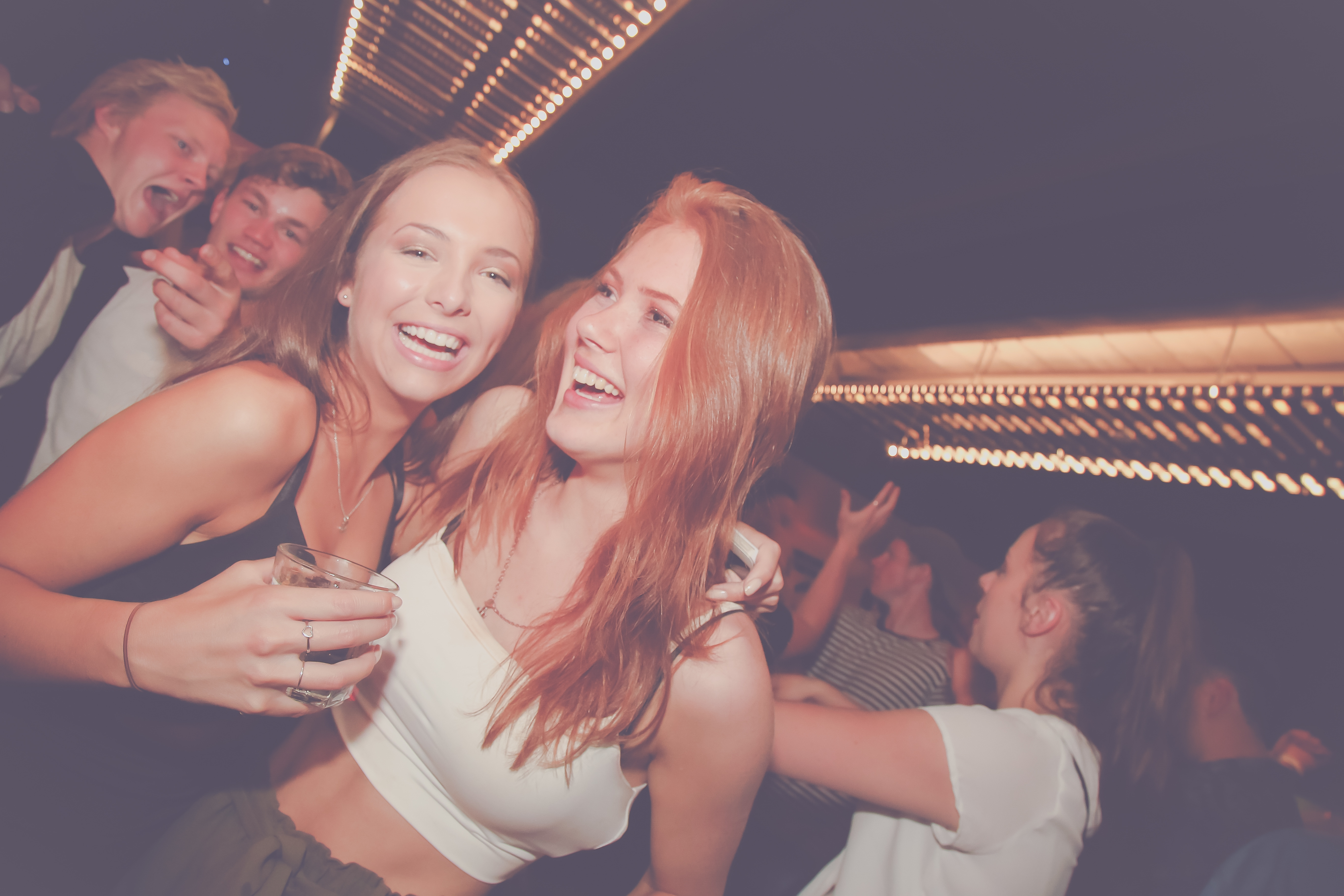 Girls laughing while partying with Big Night Out in Queenstown, New Zealand